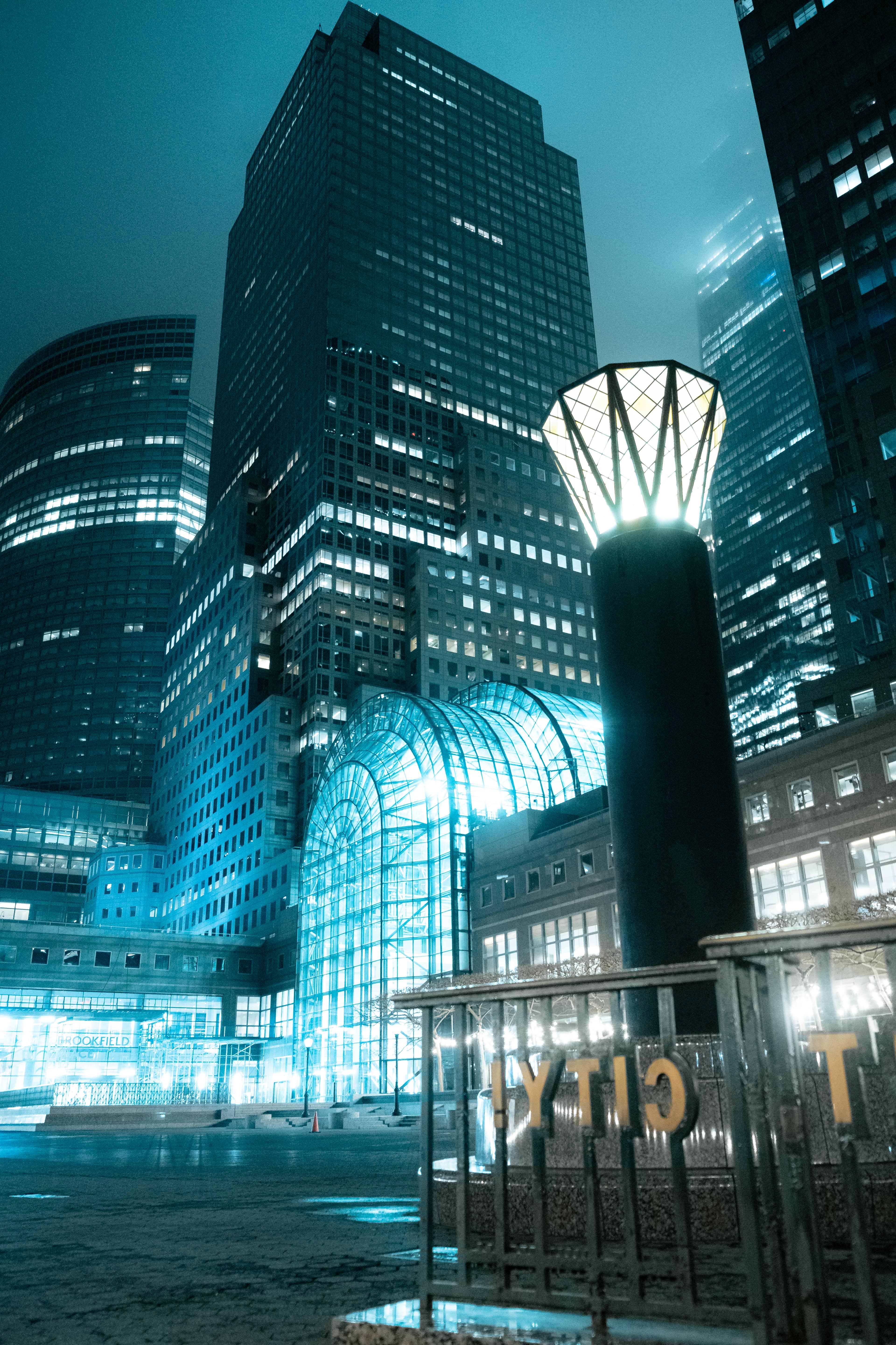 Brookfield Place towers glowing blue at night